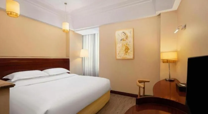 Bed in Jinrong International Hotel