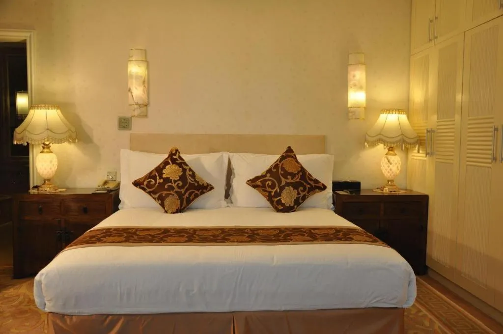 Bed in Jinrong International Hotel