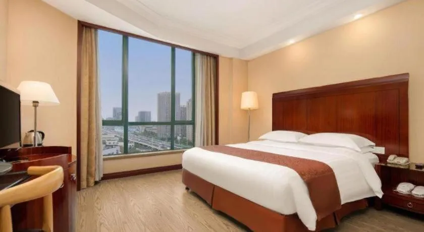 Bed in Jinrong International Hotel