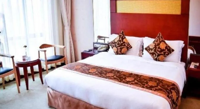 Bed in Jinrong International Hotel