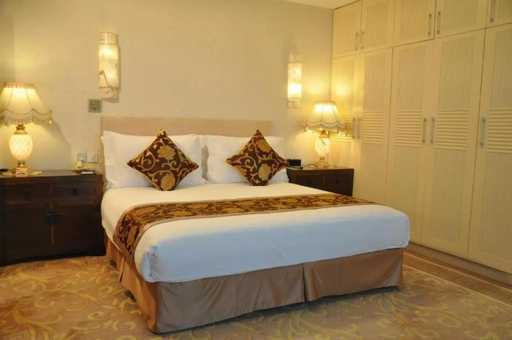 Bed in Jinrong International Hotel