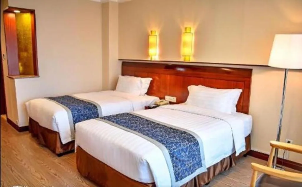 Bed in Jinrong International Hotel