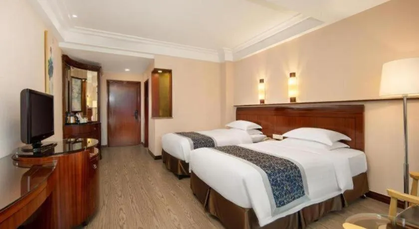 Bed in Jinrong International Hotel