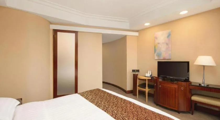 Bed in Jinrong International Hotel