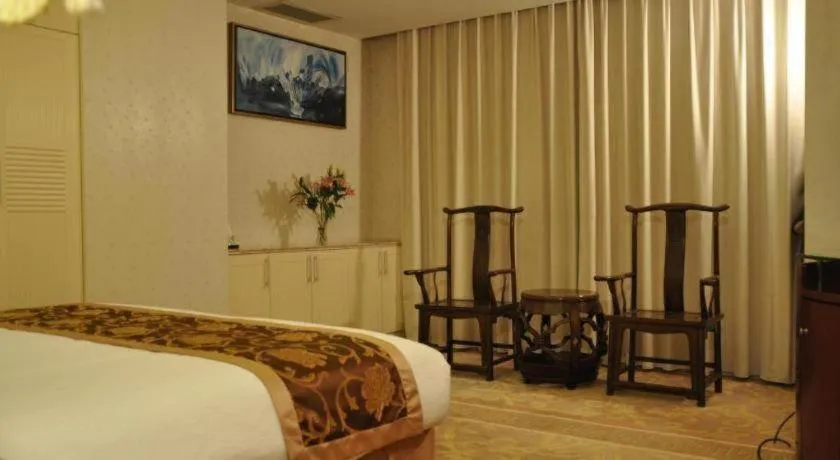 Bed in Jinrong International Hotel