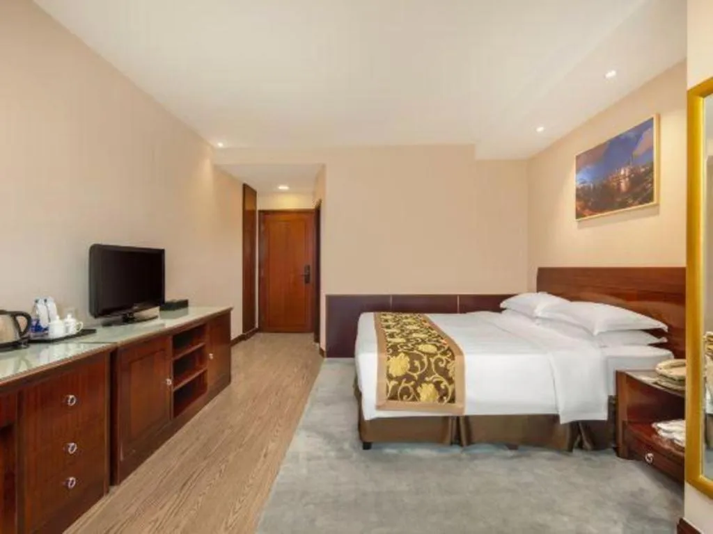 Bed in Jinrong International Hotel