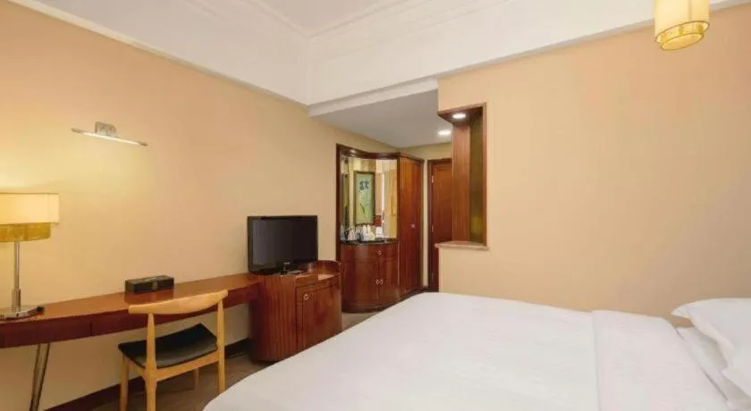 Bed in Jinrong International Hotel