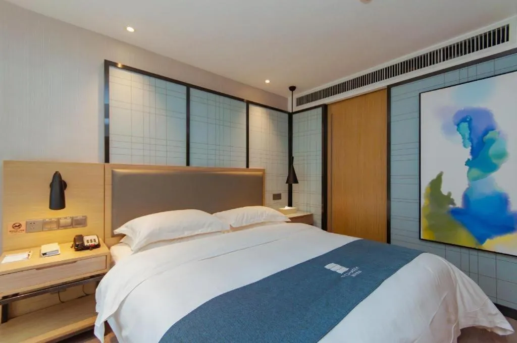 Bed in Echarm Hotel Guiyang International Convention & Exhibition Center