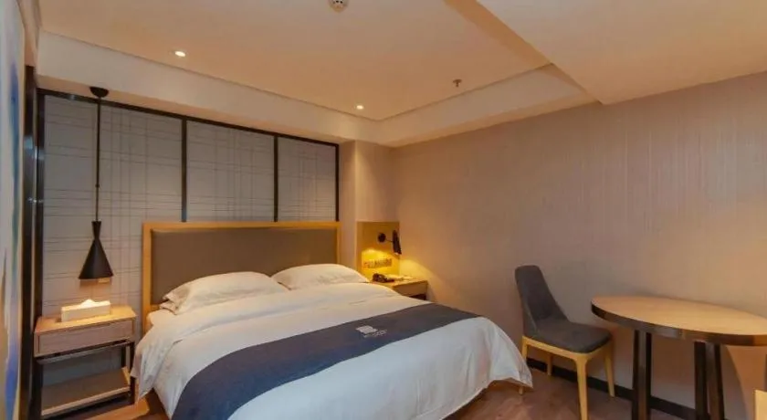 Bed in Echarm Hotel Guiyang International Convention & Exhibition Center