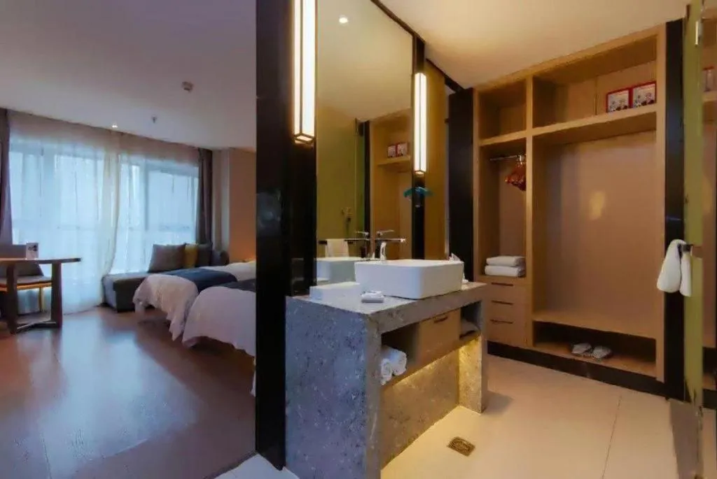 Bed in Echarm Hotel Guiyang International Convention & Exhibition Center