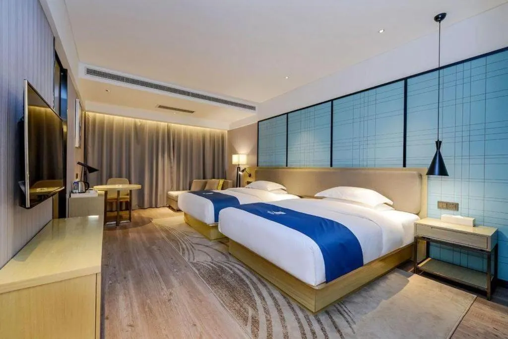 Bed in Echarm Hotel Guiyang International Convention & Exhibition Center