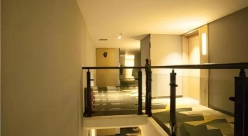 Bed in Echarm Hotel Guiyang International Convention & Exhibition Center