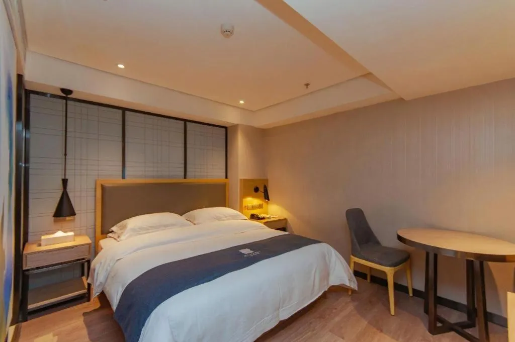 Bed in Echarm Hotel Guiyang International Convention & Exhibition Center