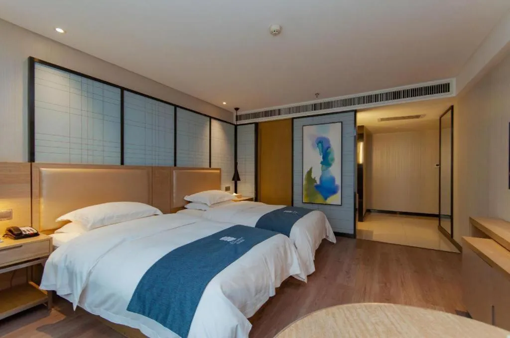 Bed in Echarm Hotel Guiyang International Convention & Exhibition Center