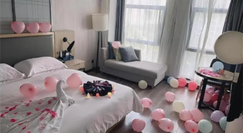 Bed in Echarm Hotel Guiyang International Convention & Exhibition Center