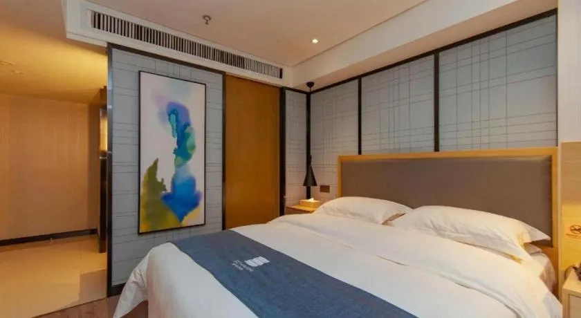 Bed in Echarm Hotel Guiyang International Convention & Exhibition Center