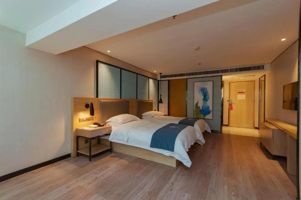 Bed in Echarm Hotel Guiyang International Convention & Exhibition Center