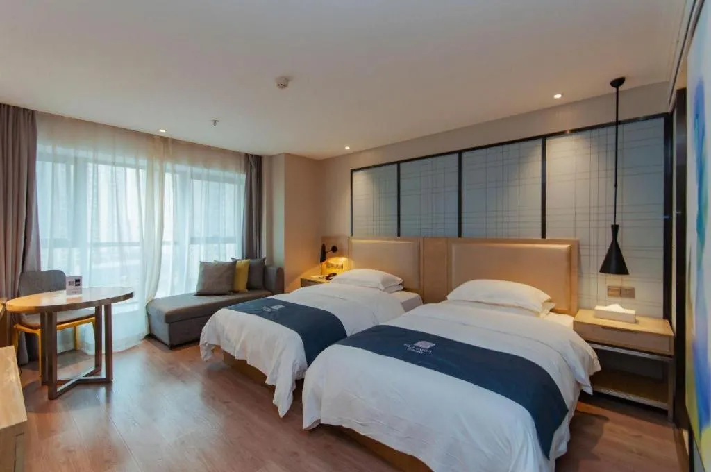 Bed in Echarm Hotel Guiyang International Convention & Exhibition Center