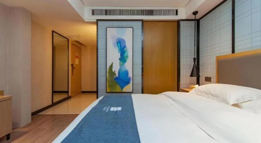 Bed in Echarm Hotel Guiyang International Convention & Exhibition Center