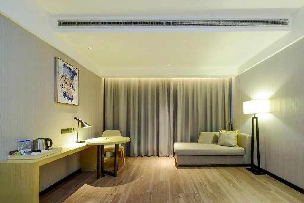 Bed in Echarm Hotel Guiyang International Convention & Exhibition Center