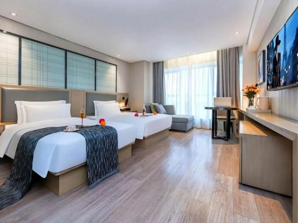 Bed in Echarm Hotel Guiyang International Convention & Exhibition Center