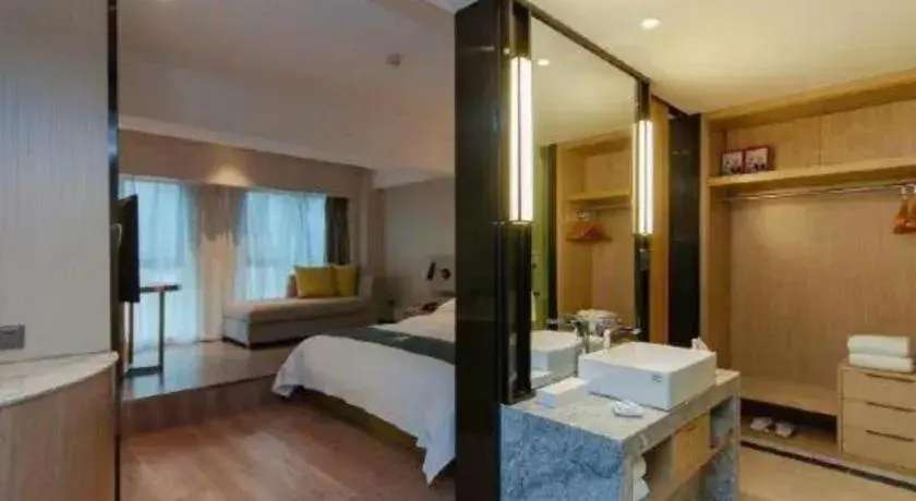 Bed in Echarm Hotel Guiyang International Convention & Exhibition Center Bed in Echarm Hotel Guiyang International Convention & Exhibition Center