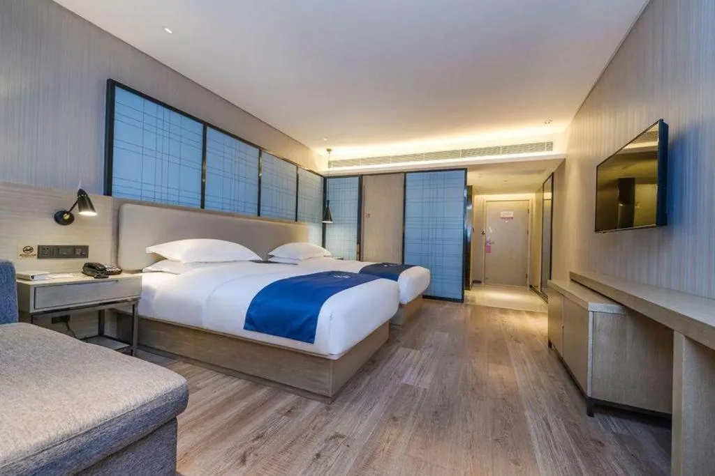 Bed in Echarm Hotel Guiyang International Convention & Exhibition Center