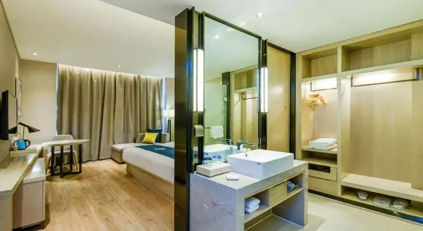 Bed in Echarm Hotel Guiyang International Convention & Exhibition Center Bed in Echarm Hotel Guiyang International Convention & Exhibition Center