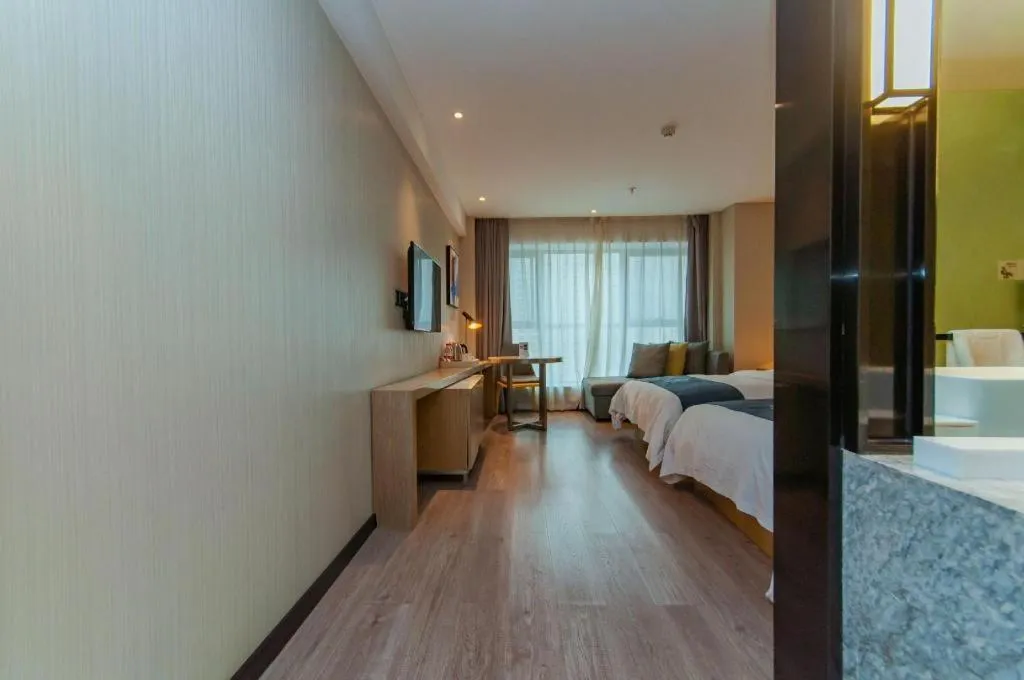 Bed in Echarm Hotel Guiyang International Convention & Exhibition Center