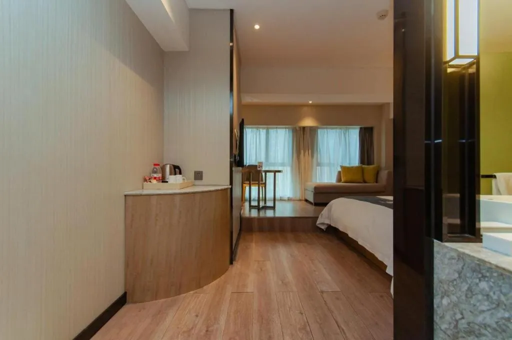 Bed in Echarm Hotel Guiyang International Convention & Exhibition Center