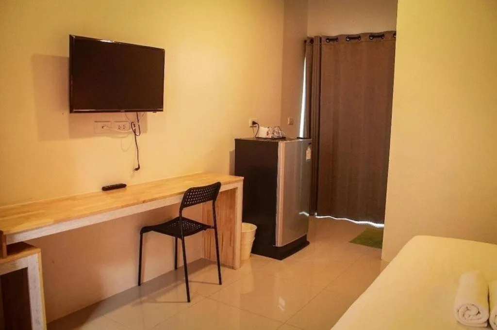 Bed in Nata Resort Chanthaburi II