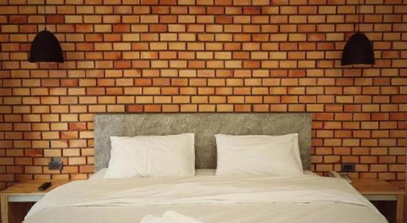 Bed in Nata Resort Chanthaburi II