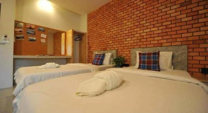 Bed in Nata Resort Chanthaburi II