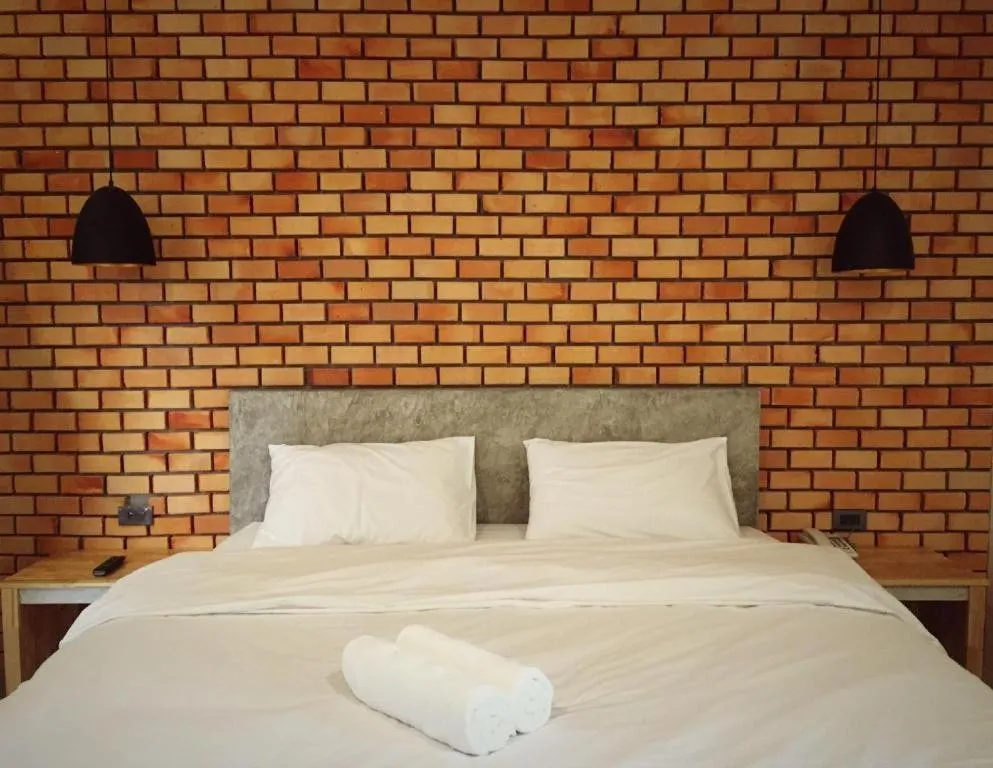 Bed in Nata Resort Chanthaburi II