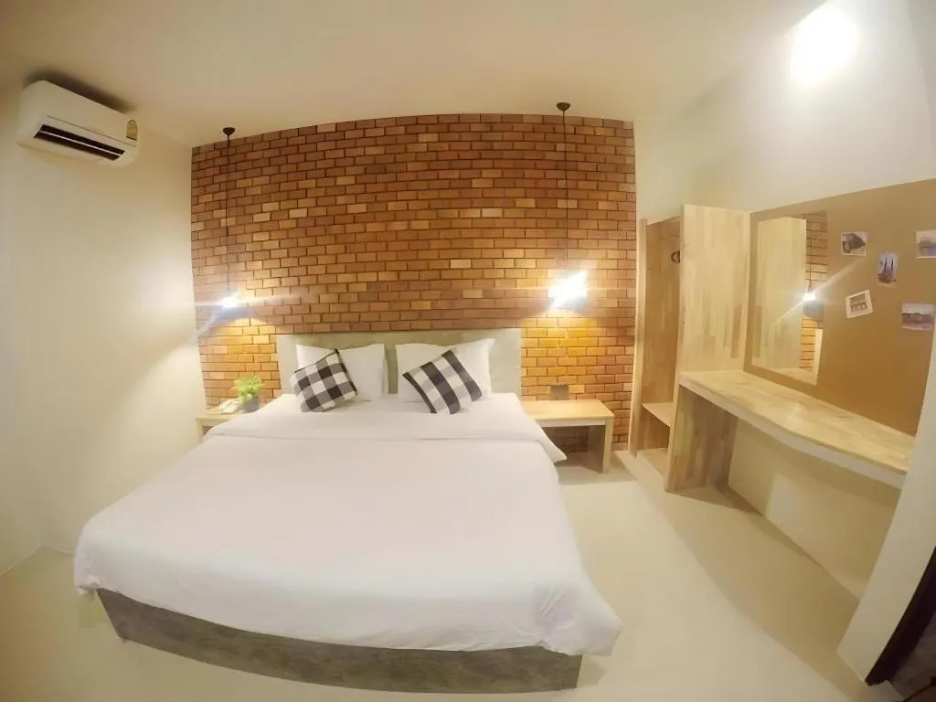 Bed in Nata Resort Chanthaburi II