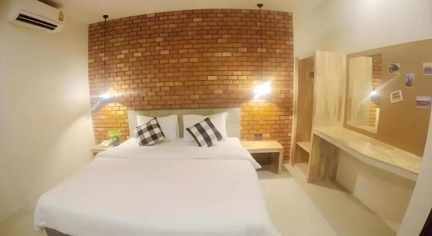 Bed in Nata Resort Chanthaburi II