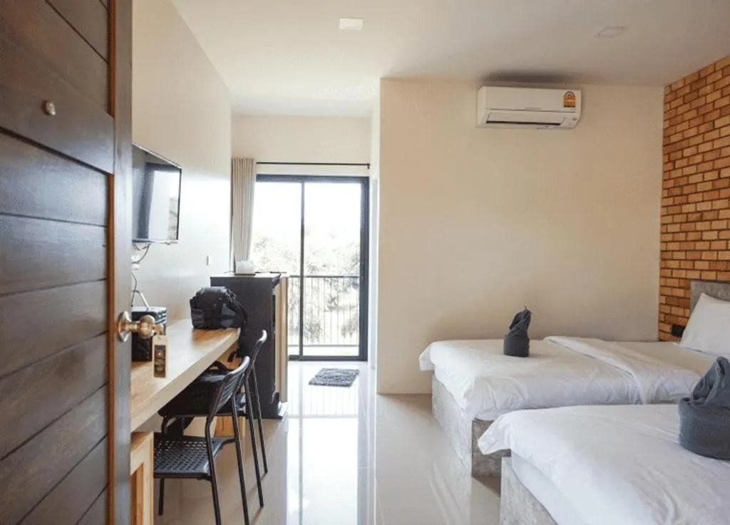 Bed in Nata Resort Chanthaburi II