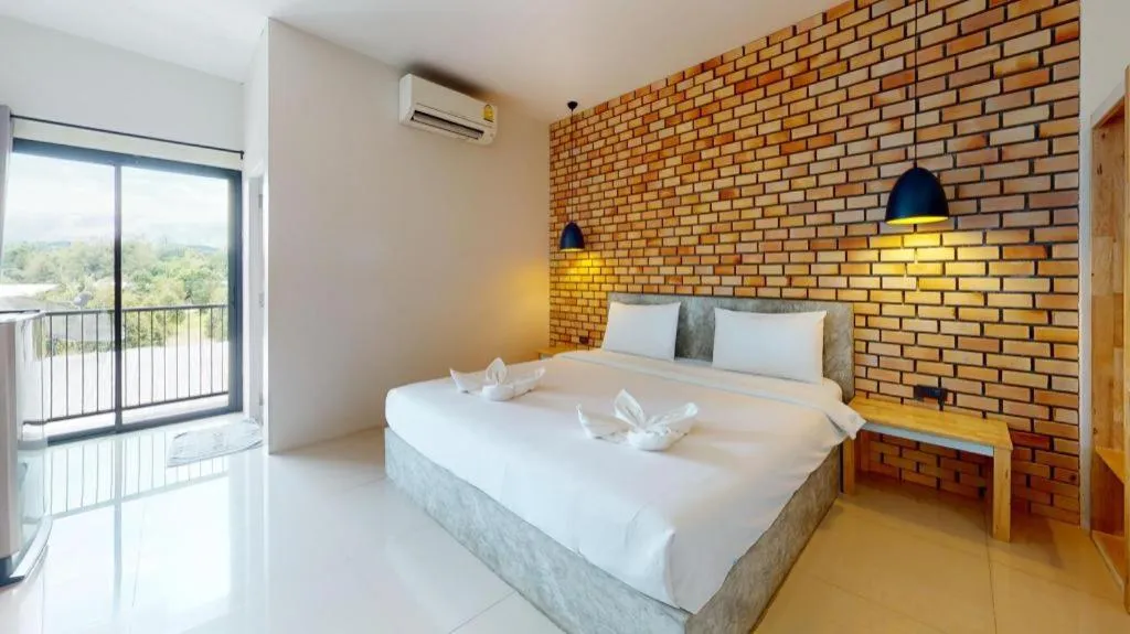 Bed in Nata Resort Chanthaburi II