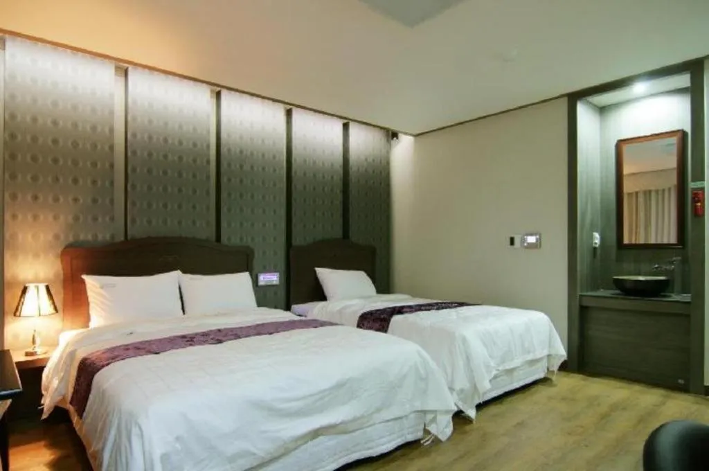 Bed in Benikea Ariul Hotel