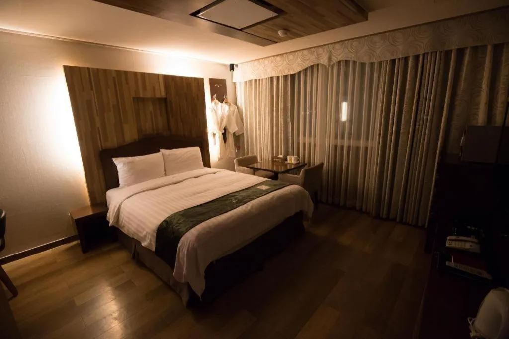 Bed in Benikea Ariul Hotel