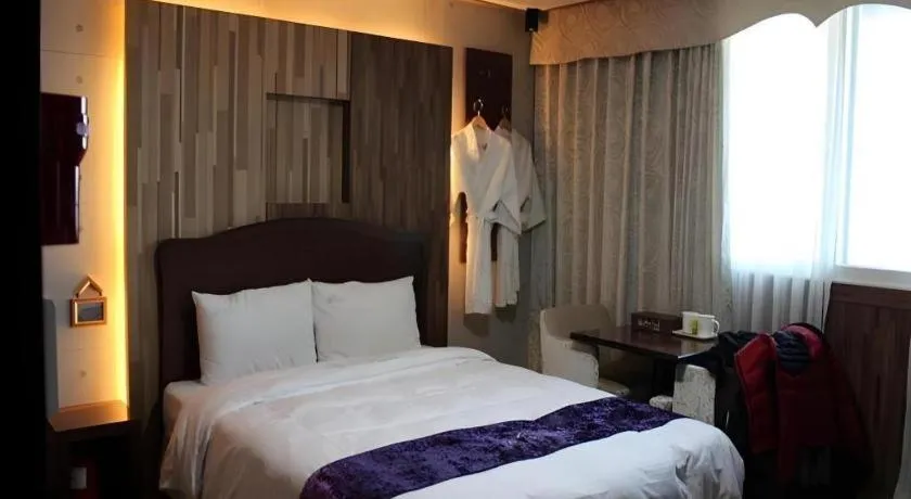 Bed in Benikea Ariul Hotel