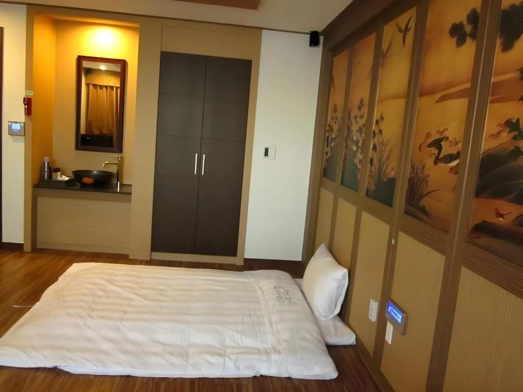 Bed in Benikea Ariul Hotel