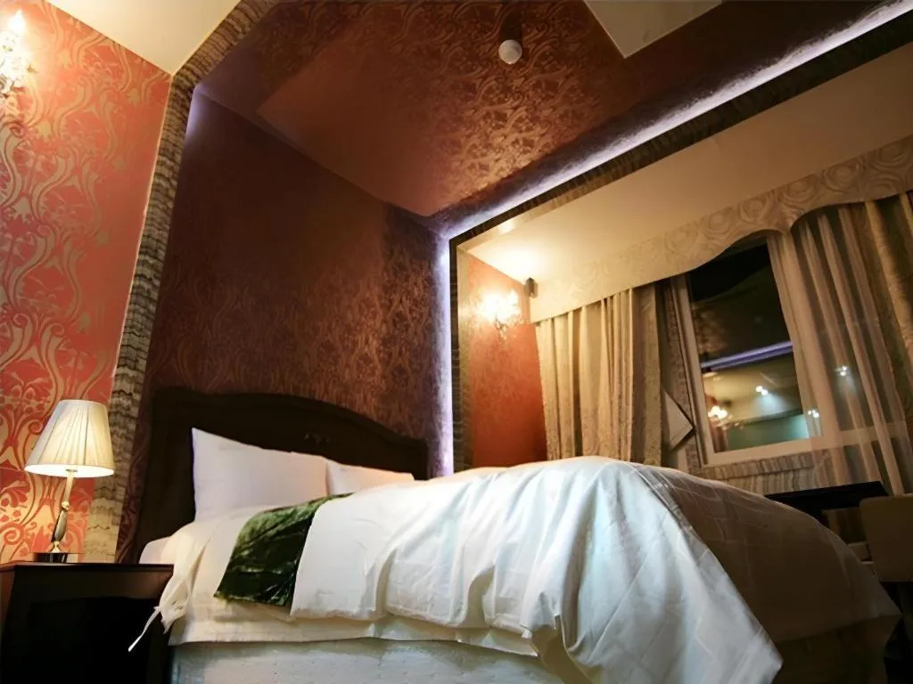 Bed in Benikea Ariul Hotel