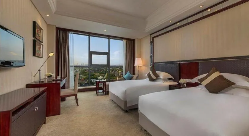 Bed in Maison New Century Hotel Cixi