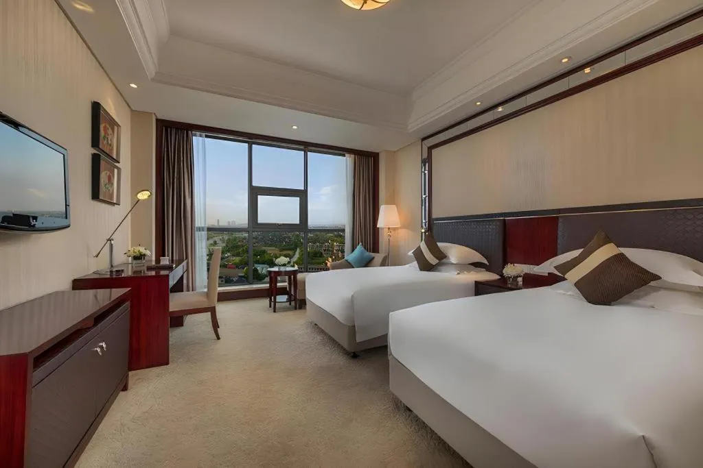 Bed in Maison New Century Hotel Cixi