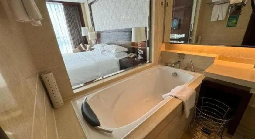 Bed in Maison New Century Hotel Cixi