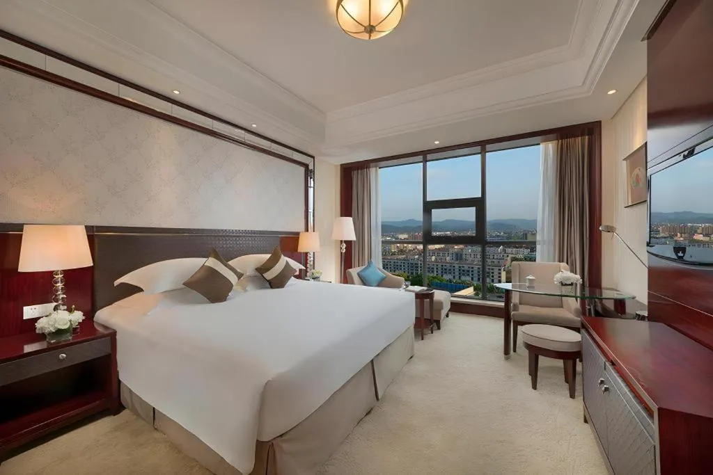 Bed in Maison New Century Hotel Cixi