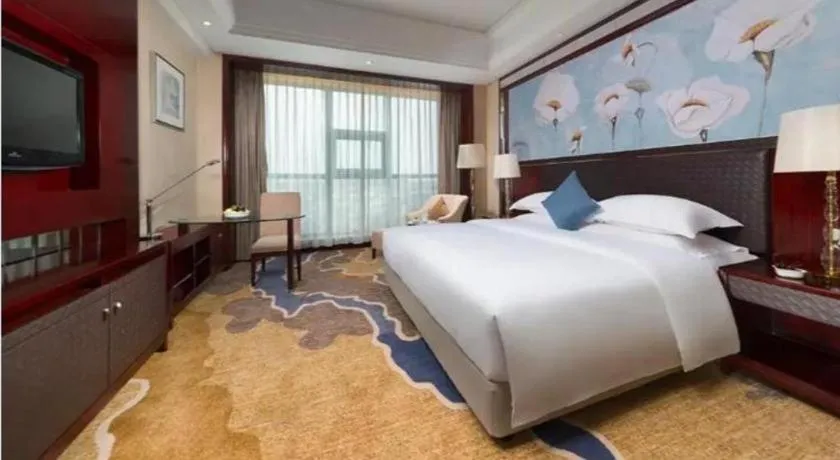 Bed in Maison New Century Hotel Cixi