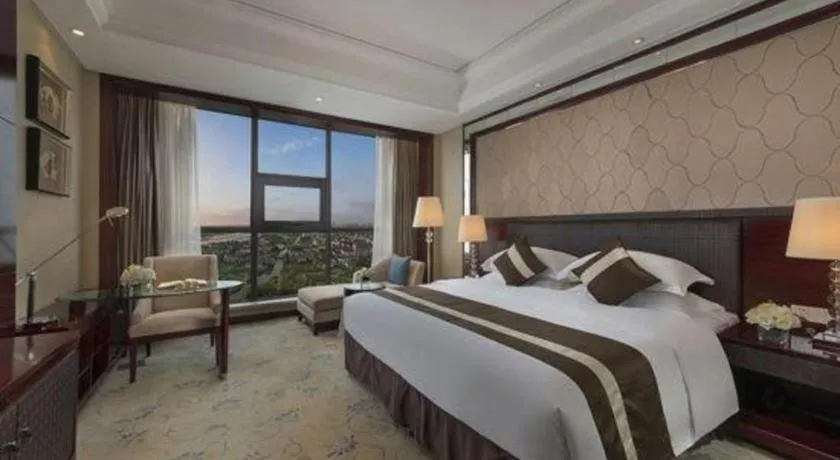 Bed in Maison New Century Hotel Cixi