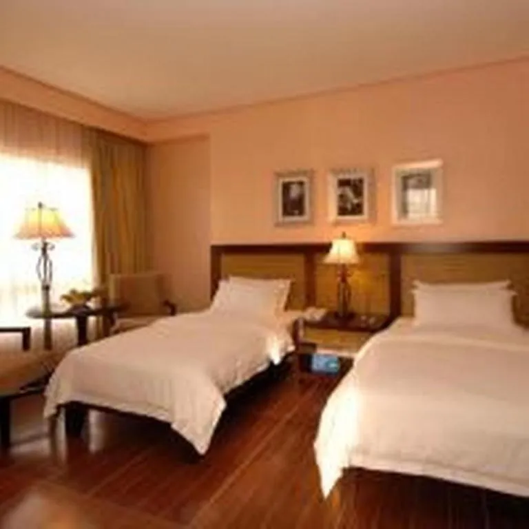 Bed in Planta Centro Bacolod Hotel & Residences